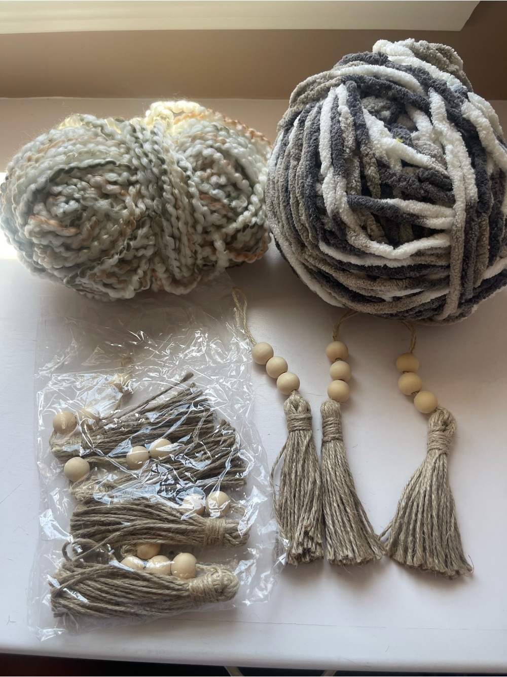 Neutral Yarn Bundle with Beige Tassel Accents - Home Accents
